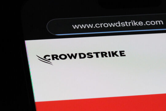 Shanghai,China-Dec. 21st 2023: CrowdStrike Holdings company brand logo on official website. American cybersecurity technology company 