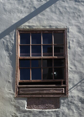 Historic facade with window in the Old Quarter of Vegueta. City center of Las Palmas. 
Gran Canaria Island. Spain. 