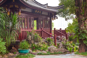 Fototapeta na wymiar Beautiful scenery with traditional Chinese style pavilion in the botanical park,China