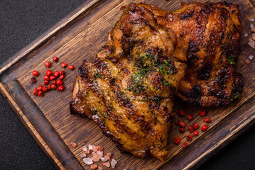 Delicious juicy beef or chicken steak with salt, spices and herbs
