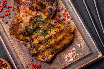 Delicious juicy beef or chicken steak with salt, spices and herbs