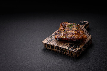 Delicious juicy beef or chicken steak with salt, spices and herbs