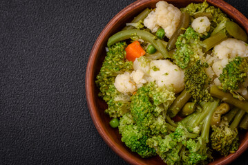 Delicious fresh vegetables steamed carrots, broccoli, cauliflower