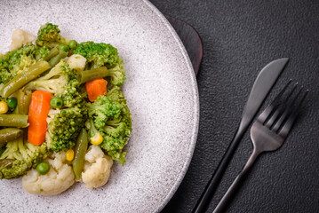 Delicious fresh vegetables steamed carrots, broccoli, cauliflower