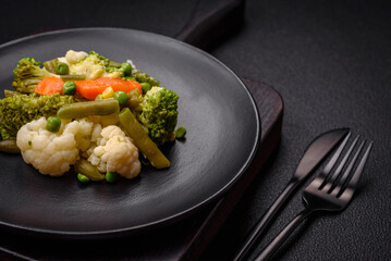 Delicious fresh vegetables steamed carrots, broccoli, cauliflower