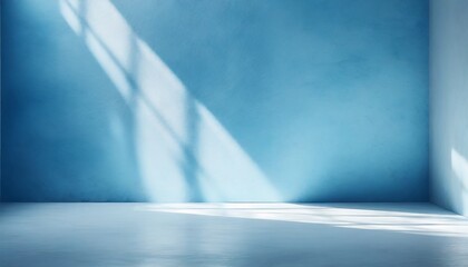 minimal abstract light blue background for product presentation shadow and light from windows on plaster wall