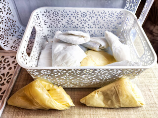 Plastic bag folded into a triangle for storage. Ways of storing and laying at home