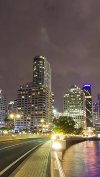 Brickell Key Drive and Miami Downtown at Night. Road Traffic. Time Lapse, United States of America. Vertical Video
