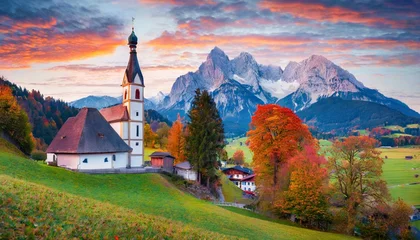 Fotobehang iconic picture of bavaria with maria gern church with hochkalter peak on background fantastic autumn sunrise in alps superb evening landscape of germany countryside traveling concept background © Bryson