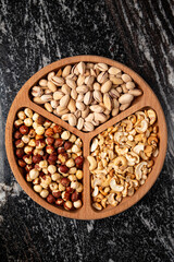 nuts in the wooden plate