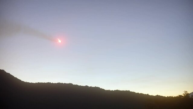 Meteorite falls to earth. Sunrise Red metorit