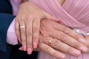 Details of the hands of the bride and groom with rings in a beautiful wedding, marriage ceremony