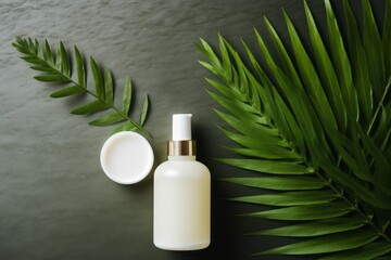 Aesthetic flat lay with a blank cosmetic bottle and green leaves. AI generative