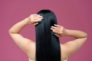 beautiful straight hair isolated on pink background