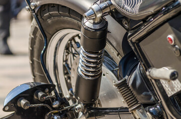 Fototapeta na wymiar bobber chopper motorcycle rear wheel closeup