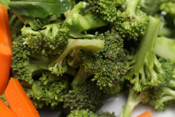 natural food. green and orange foods. broccoli with carrots.