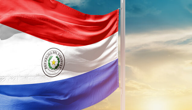 Waving flag of Paraguay in beautiful sky. Flag for independence day - Image