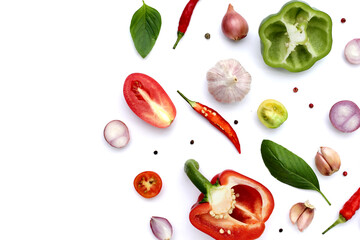 Various fresh vegetables and herbs on white background.