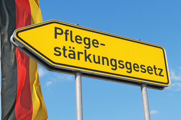 Symbolfoto: Pflegestärkungsgesetz mit deutscher Nationalflagge