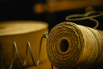 coil of rope in the upholstery repair shop 
