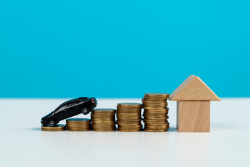 Coins with house and car model