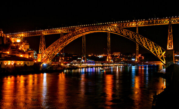 Luis I Bridge illuminated at night in Porto, Portugal