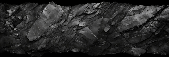 Panoramic black stone background banner design. Dark rock grunge texture. Mountain surface close-up cracked empty copy space