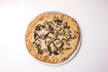 White Italian pizza with mozzarella sausage and friarielli, turnip broccoli from above on a white background