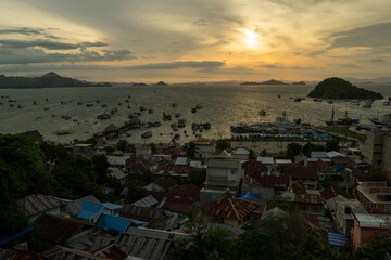 General view of Labuan Bajo Town from Puncak Waringin with the background of port during sunset.