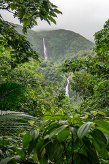 Carbet Falls a series of waterfalls on the Carbet River in Basse-Terre in a tropical rainforest on lower slopes of volcano La Soufriere., Guadeloupe, Caribbean