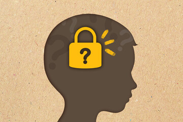 Child head silhouette with locked padlock and question marks - Concept of psychology, closed mind and mental block - 696880755
