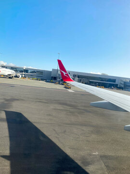 Wing of QANTAS aircraft preparing takeoff to Melbourne,
Australia at Auckland Airport, New Zealans