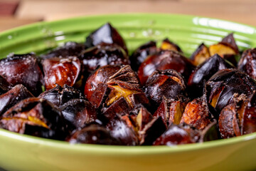 Roasted chestnuts in olive oil with sea salt, homemade food. traditional cuisine.