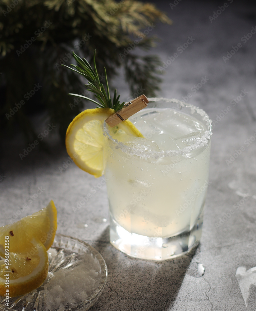 Poster A glass with lemon soda cold cocktail with ice