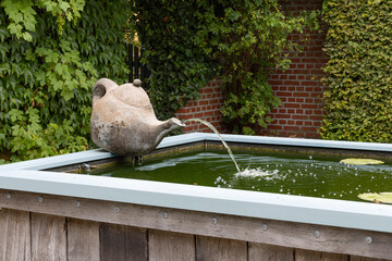 Houwerzijl, The Netherlands - August 10, 2023: Garden of Tea factory with fountain tea pot in Houwerzijl municipality Het Hogeland Groningen province in The Netherlands