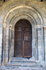 Wooden door of the Church of the Nativity of Durro, in the Bo? Valley, Lleida, Catalonia, Spain.