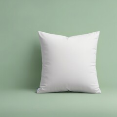 Fototapeta na wymiar white pillow mockup on a mint green backdrop.