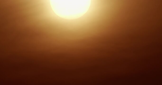 Timelapse the sun in sunset close-up big sun. 4KDCI ProRes422