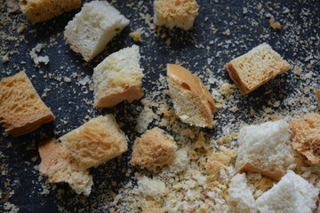 Delicious, dried fresh white bread, golden croutons in the form of delicious cubes, and golden dried breadcrumbs.