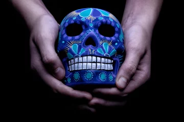 Fotobehang Traditional mexican skull made with clay and hand painted in vivid colors. © ander320