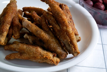 fried chicken feet on a plate