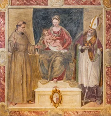 Foto op Plexiglas TREVISO, ITALY - NOVEMBER 4, 2023: The fresco of Madonna with the St. Francis of Assisi and st. Nicholas in the church Chiesa di San Francesco (1570). © Renáta Sedmáková