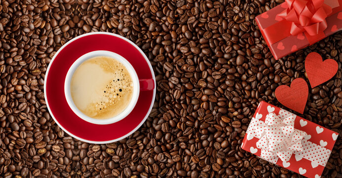 Romantic coffee beans background with red white cup of coffee, gift boxes and wooden hearts. - Powered by Adobe