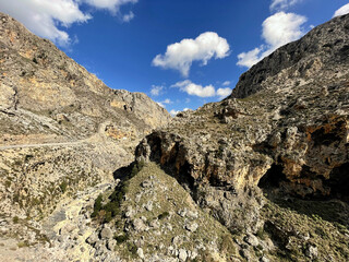 A big rocks on background of blue sky.