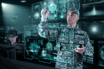 Military Think Tank, AI technology in the army. Warfare analytic operator checking coordination of the military team. Military commander with a digital device with augmented reality operating troops