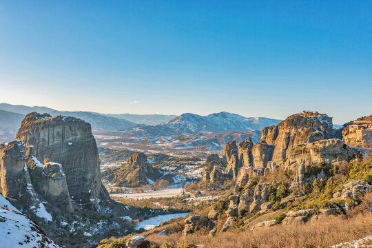 Beautiful landscape with monasteries and rock formations in Meteora in winter time, Greece.