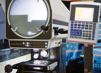 Profile projector dimension measurement machine measuring workpiece dimension in second. Industrial manufacturing