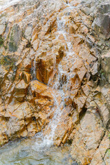 A waterfall in a nature park.  Cloudy weather. Yang Bay Ecopark in Vietnam near Nha Trang.