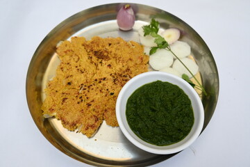 Makki Ki Roti and Sarson Ka Sag. It is Corn floor flat bread and  mustard greens curry respectively. Popular Punjabi food. Delicious Indian food. Makai ki roti and sarso ki sag.
