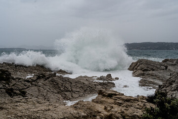 Fototapeta na wymiar Waves crashing during storm on a rocky shore